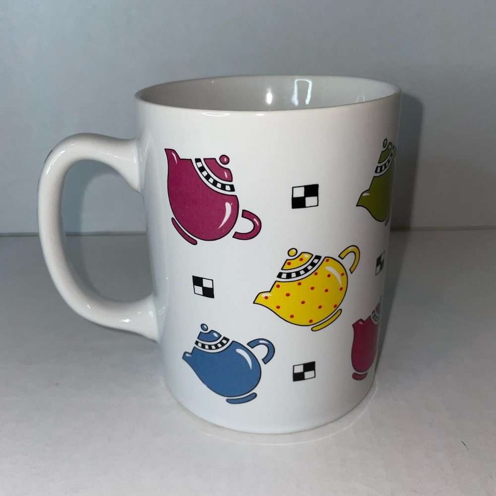Mary Engelbreit Porcelain Coffee Mug with Colorful Tea Pots Design Black Tiles